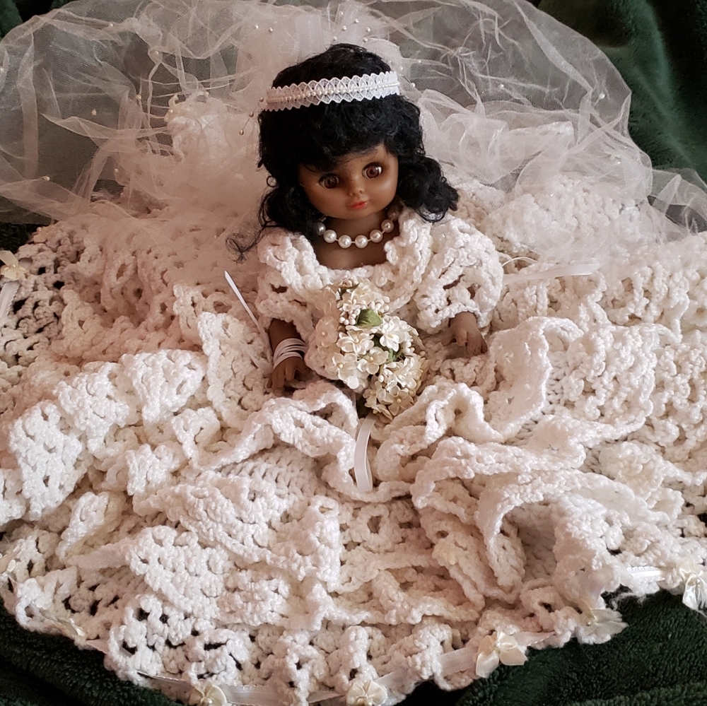 Beautiful Doll wearing Crocheted Dress